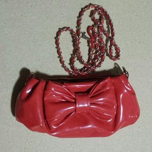Red , chic purse. With attachable chain